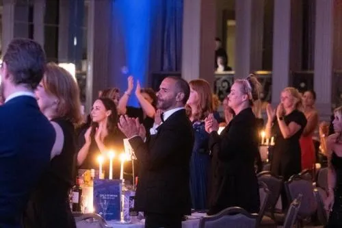 The Child of Britain Choir receive a standing ovation from guests